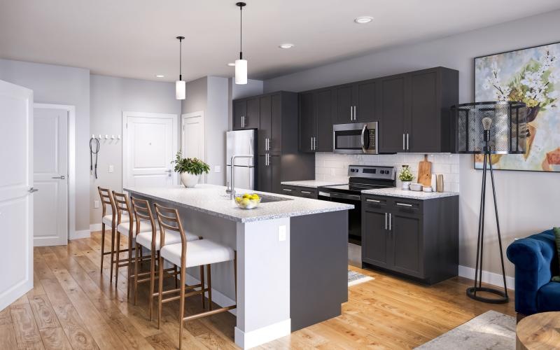 a kitchen with a table and chairs